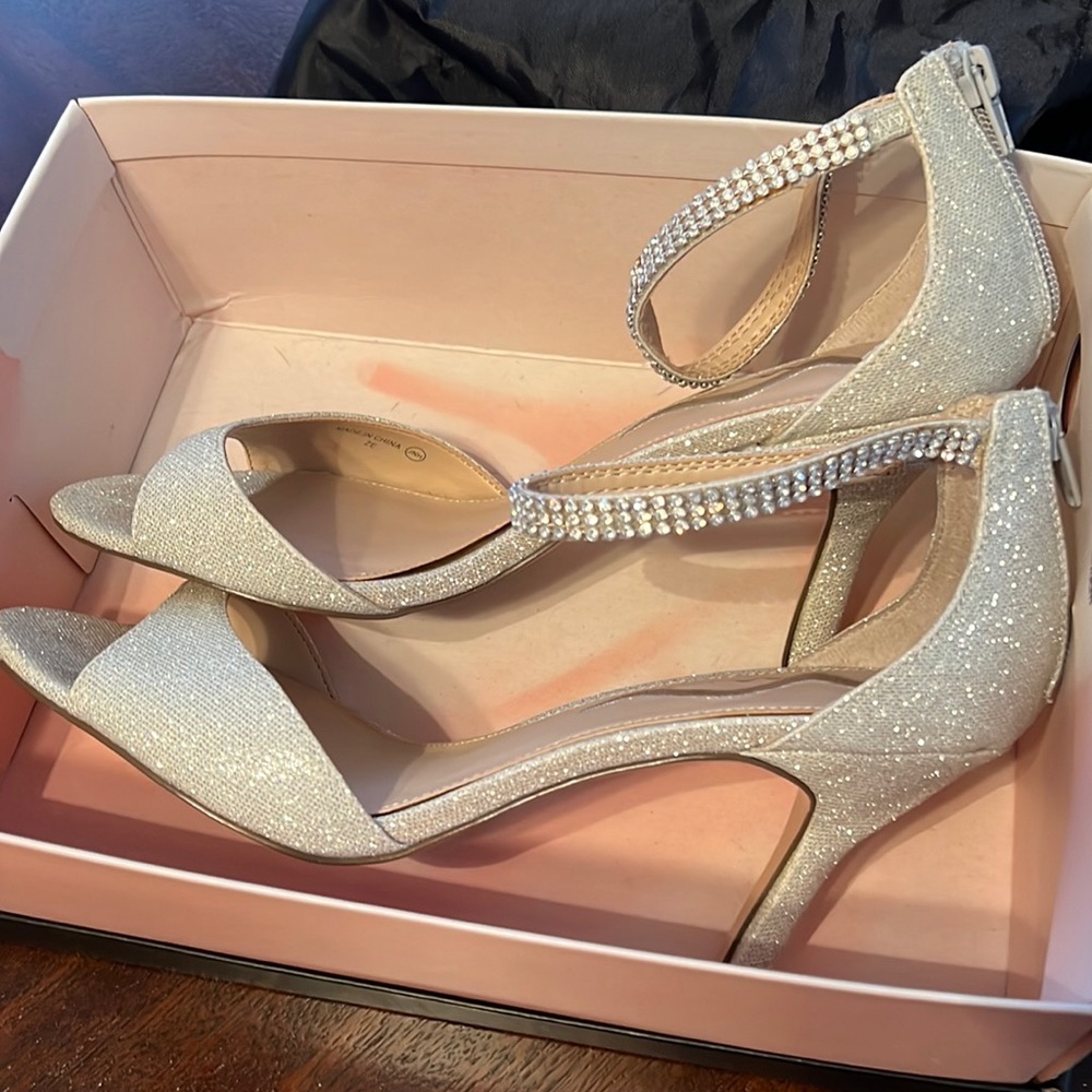 Silver 4 inch heel with rhinestone strap and zipper back